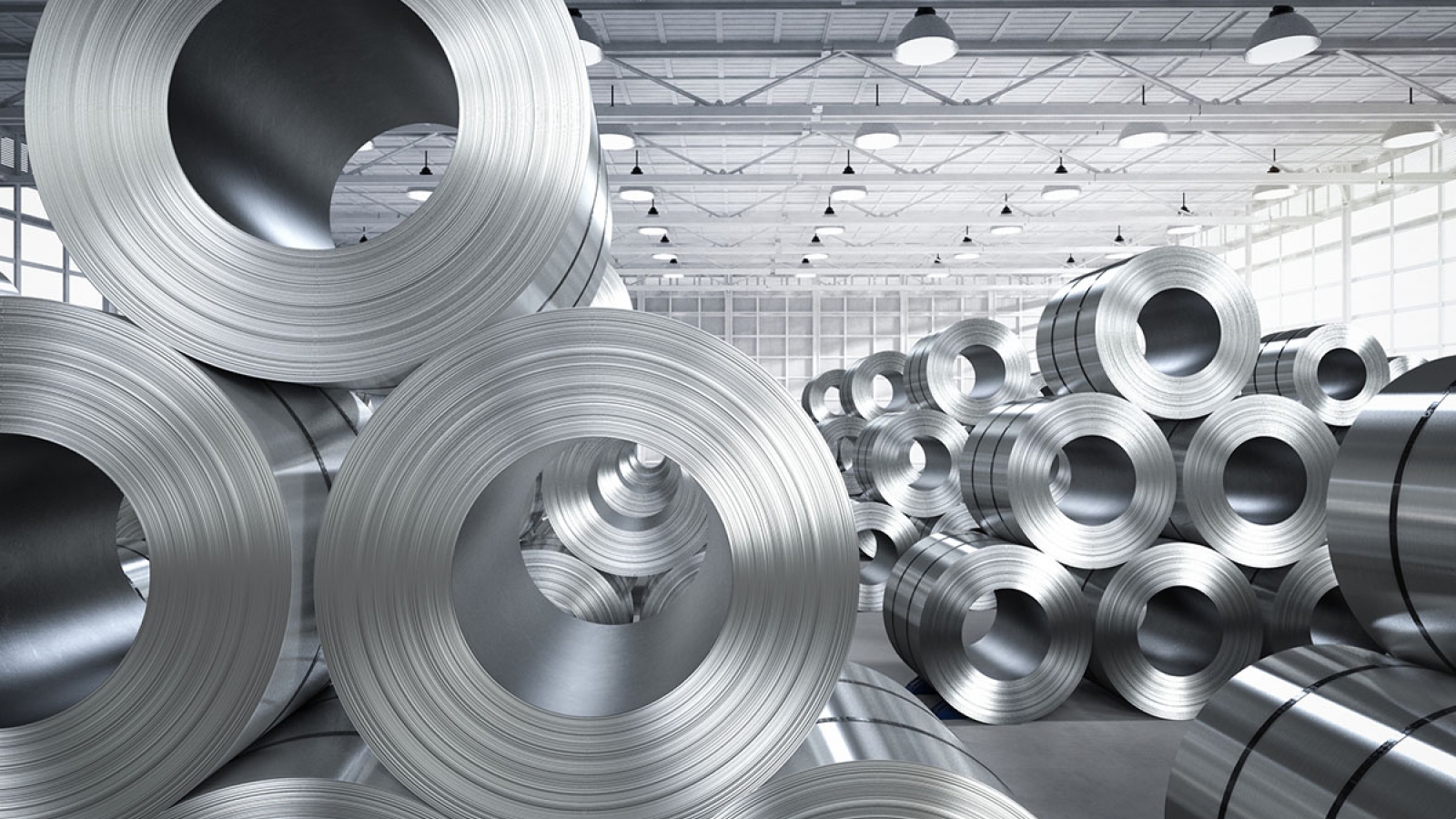 rolls of aluminum inside a warehouse