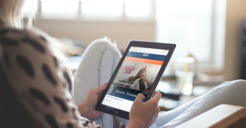 Woman looking at the Census website
