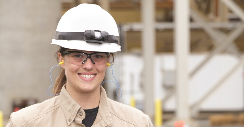 Female employee with hardhat