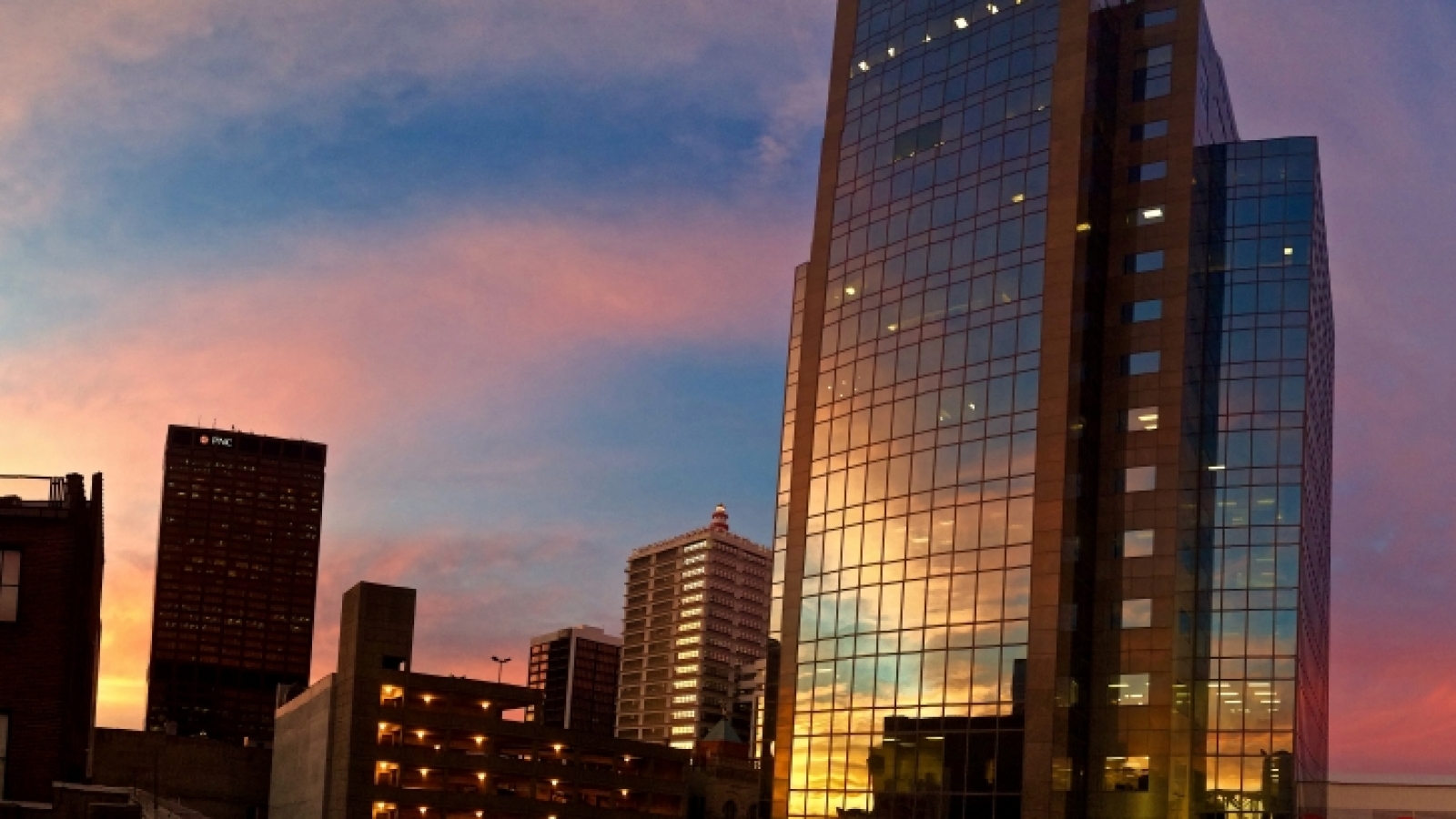 Louisville skyline with LG&E Building in foreground at dusk