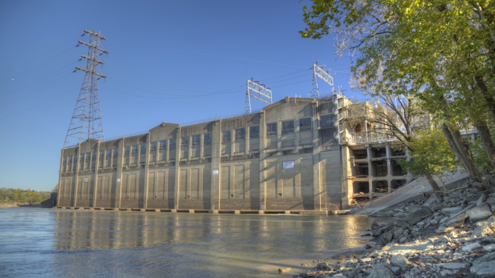 Ohio Falls Station from a low vantage point on the shore of the Ohio River in Louisville, Kentucky