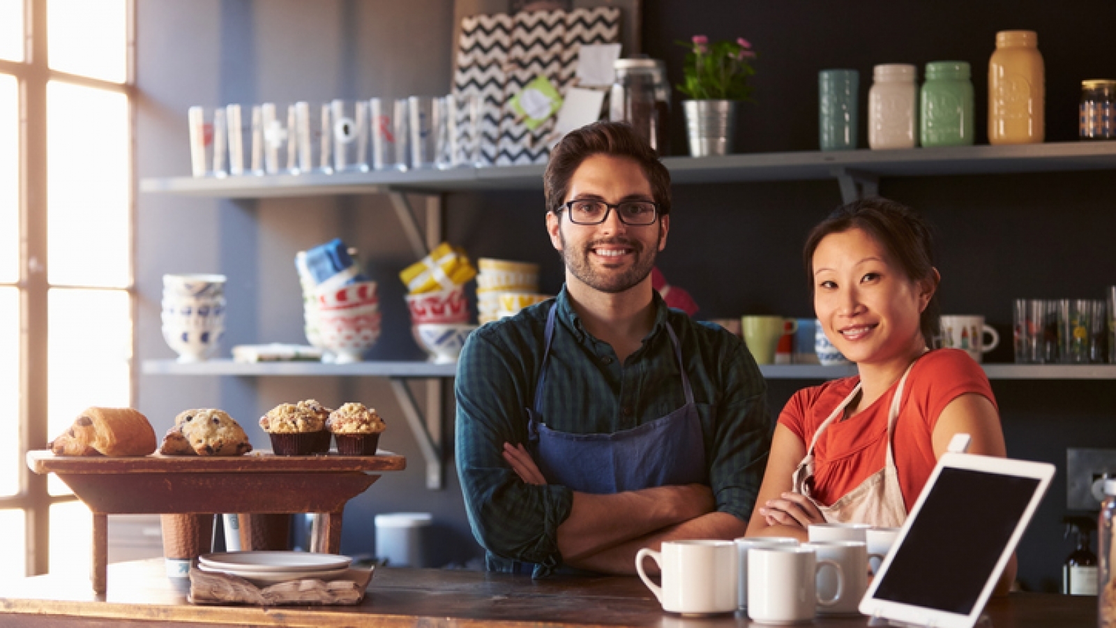 small business owners behind a counter