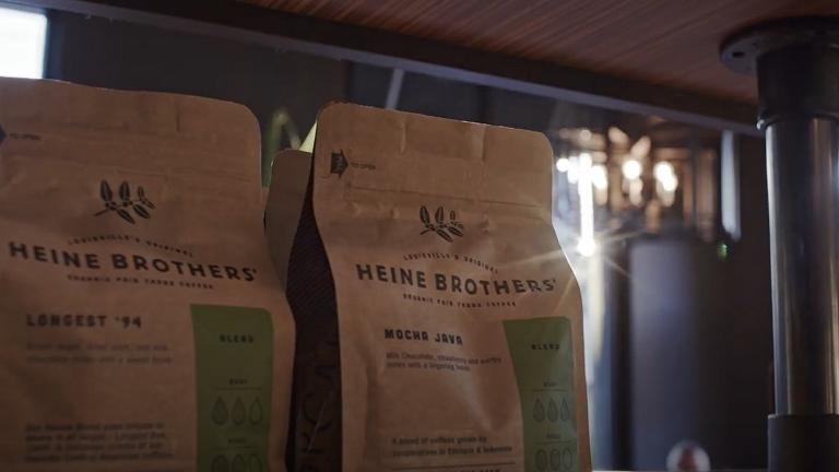 two bags of coffee on a shelf