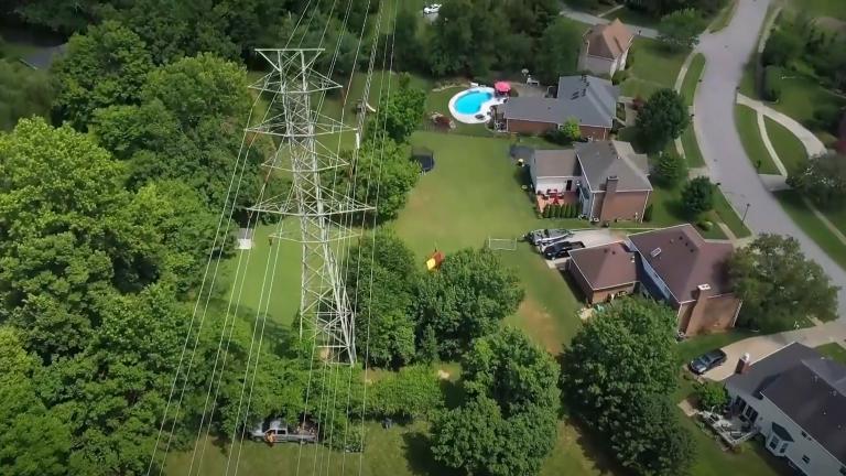aerial view of power lines and houses