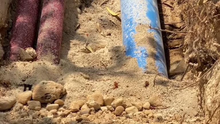 pipes going into a trench