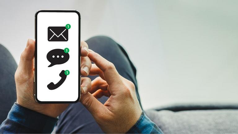 hands holding a smartphone with icons on it