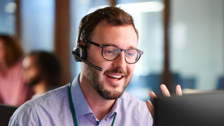 call center representative with headset on