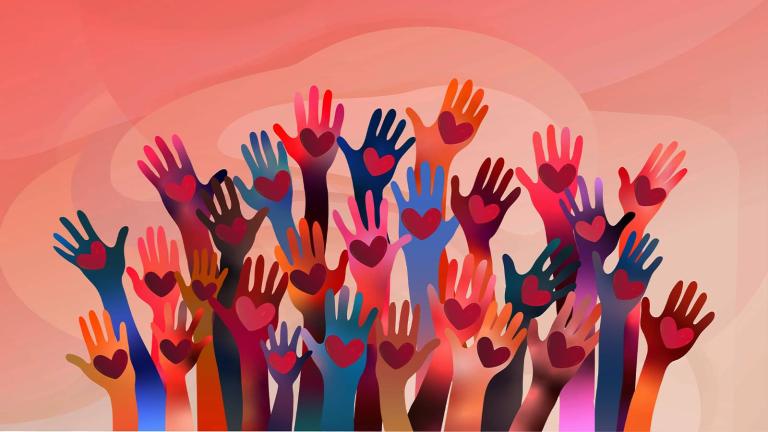 hands raised with hearts in the palms