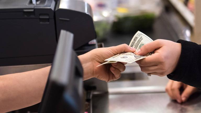 cashier receiving cash