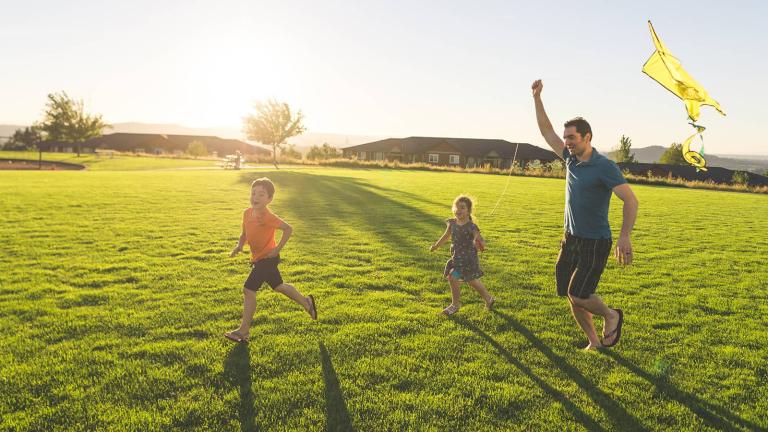 children flying a kite