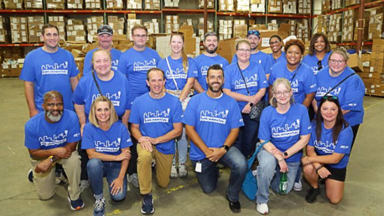employees at a community event