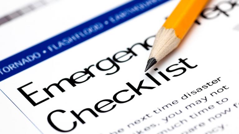 Emergency checklist sheet with pencil on it