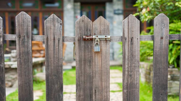 locked wooden fence gate