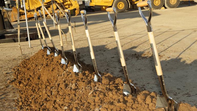 Groundbreaking ceremony - shovels in a pile of dirt