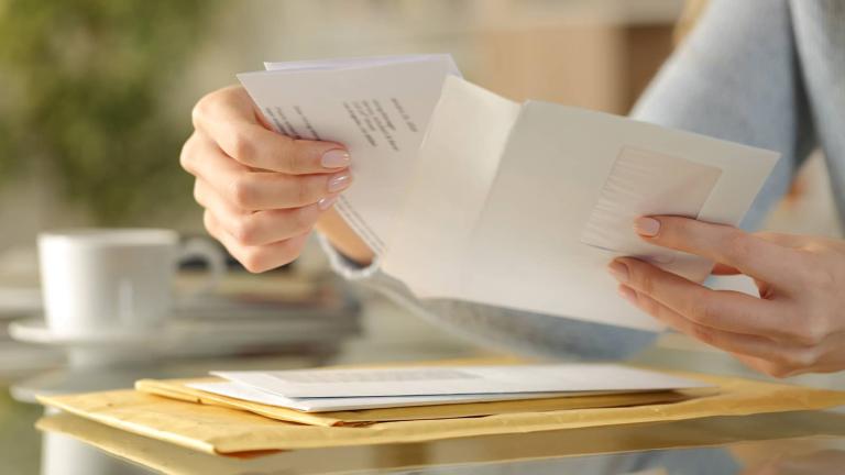 person opening bill