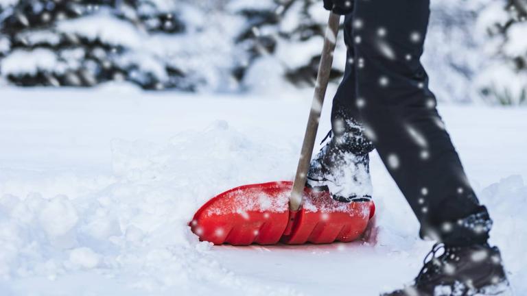 person shoveling snow