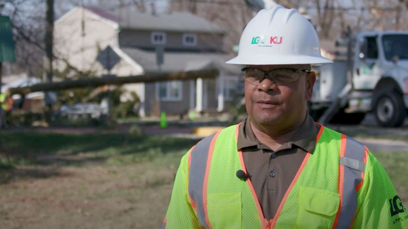 employee on site of restoration talking to interviewer