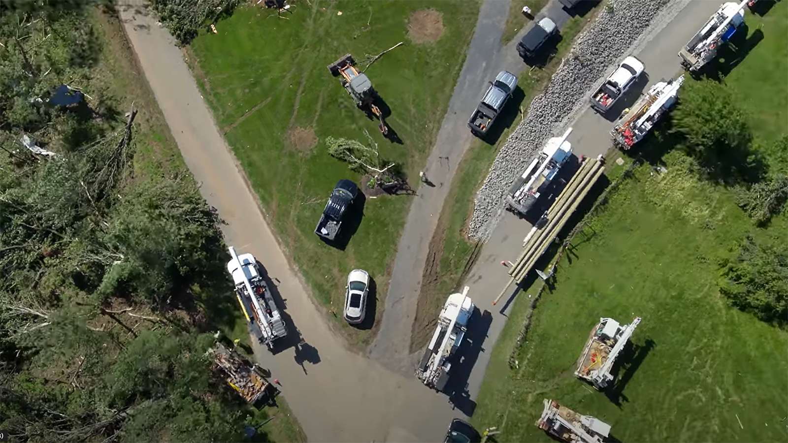 aerial view of bucket trucks restoring power