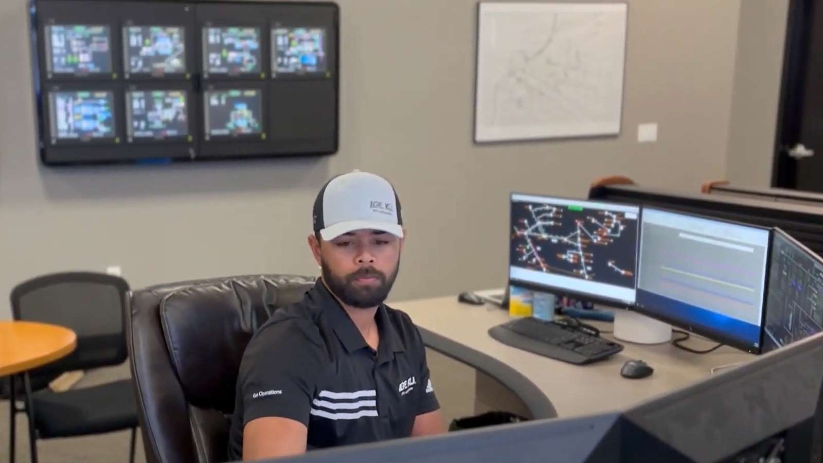 Gas employee at desk monitoring operations