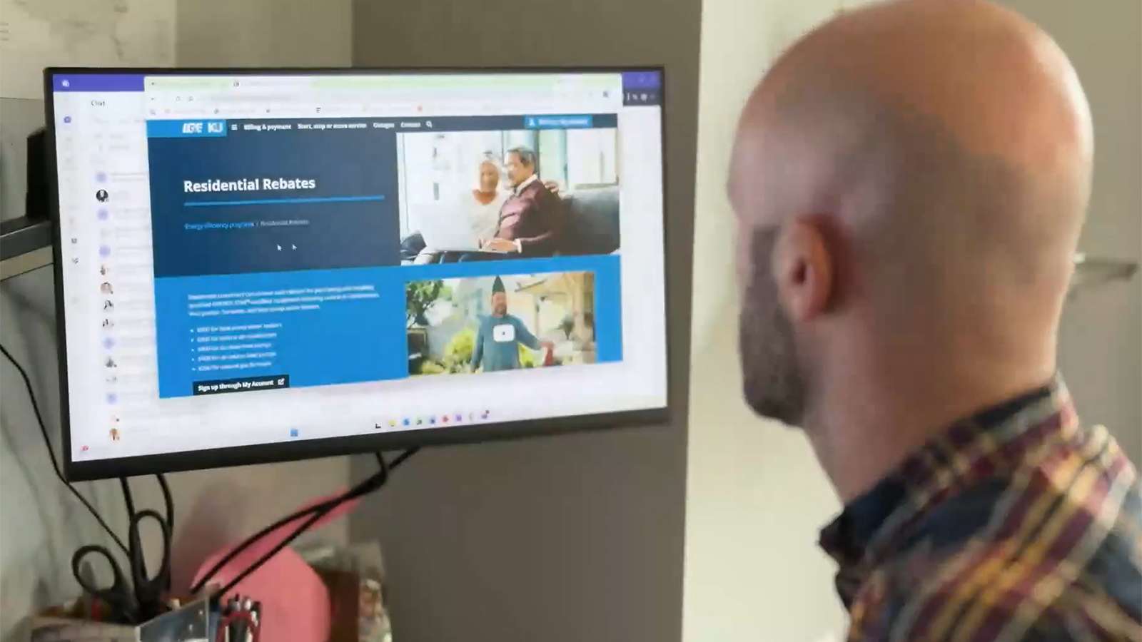 person viewing a web page on a monitor