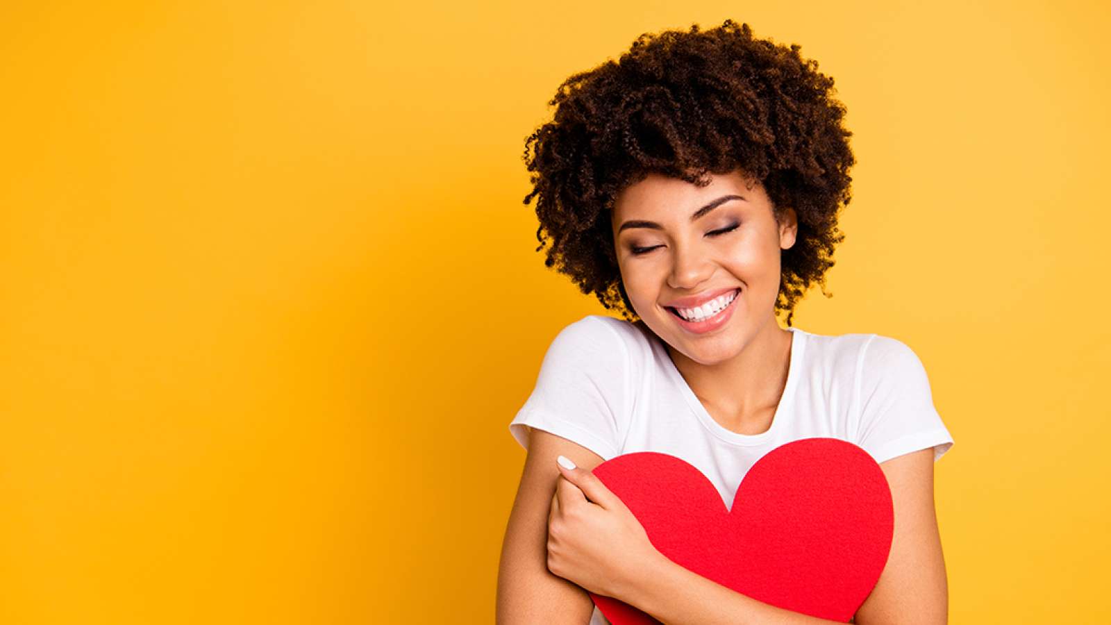 Woman holding heart