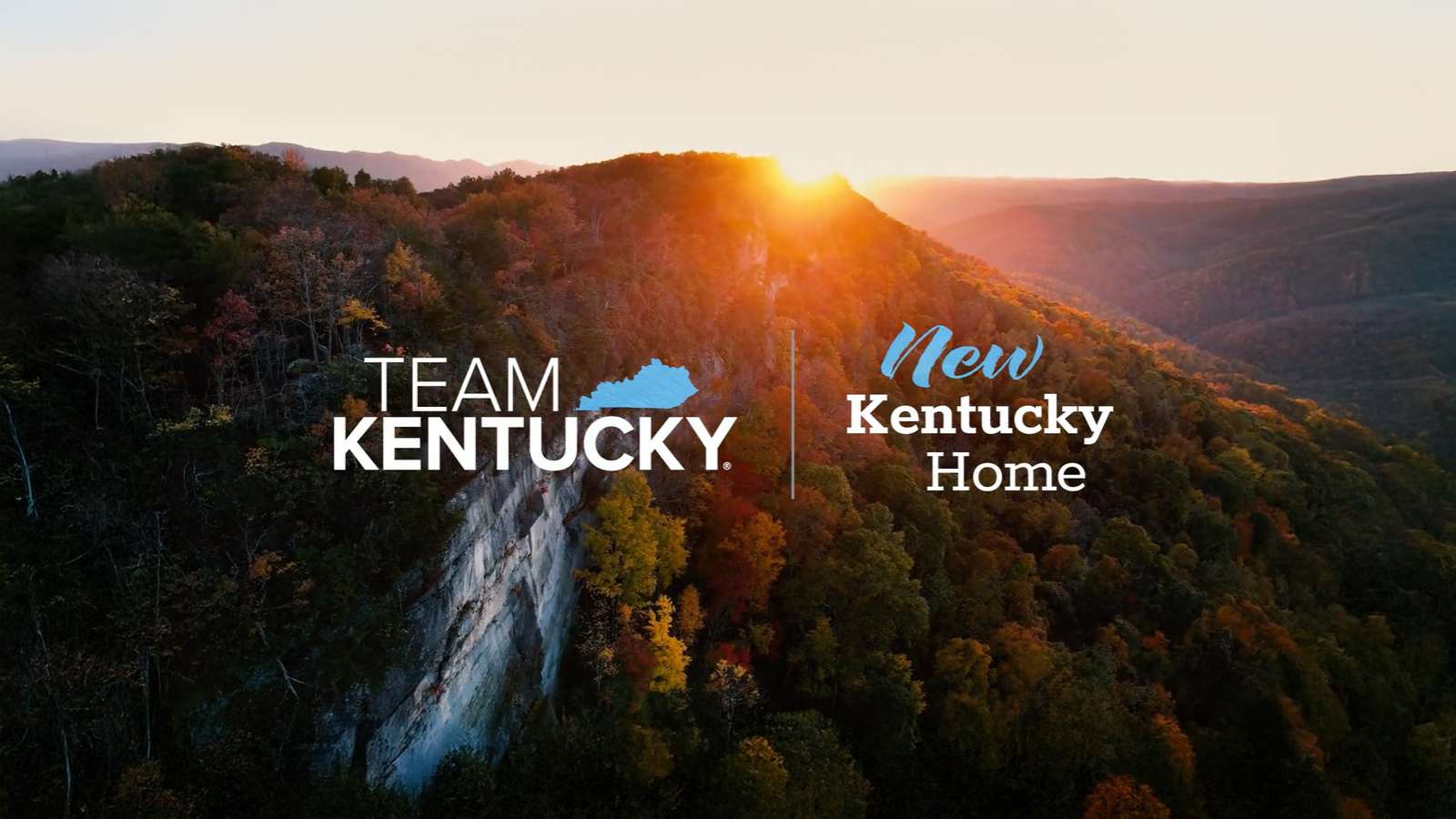 Team Kentucky and New Kentucky Home graphic over wooded mountain