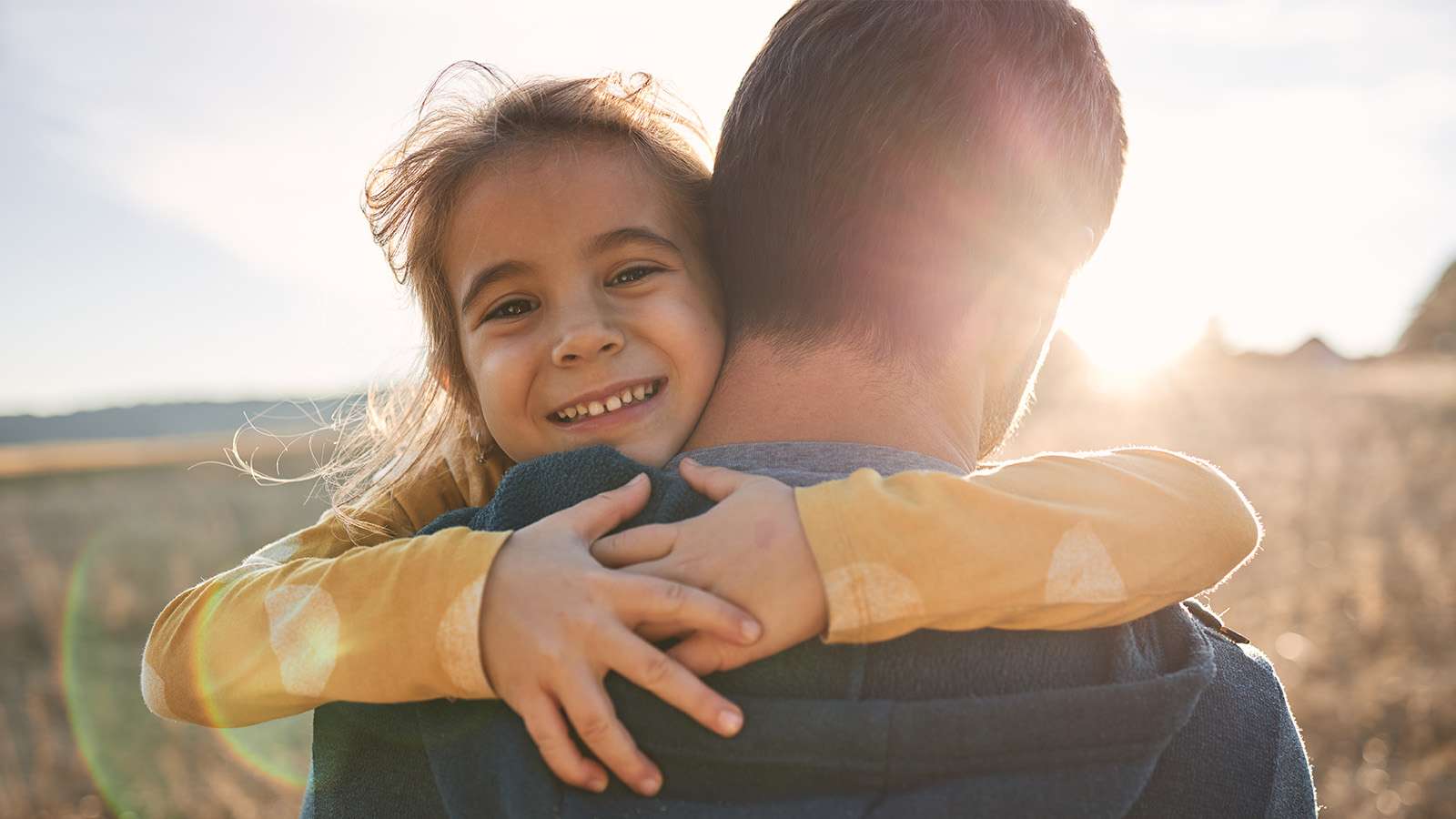 girl hugging dad