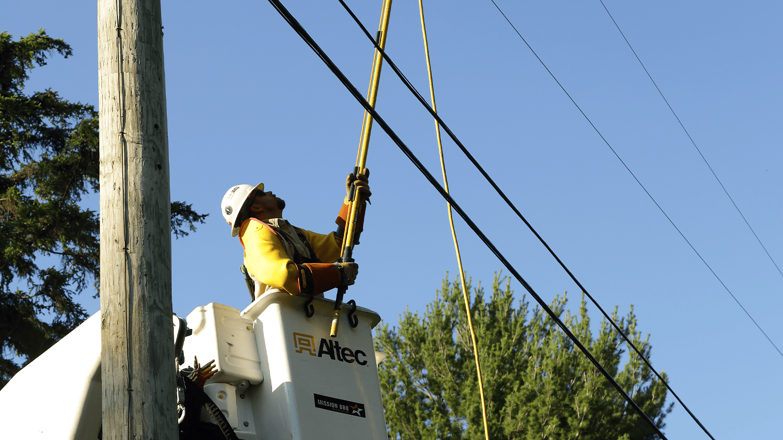 line technician in a bucket truck restoring power