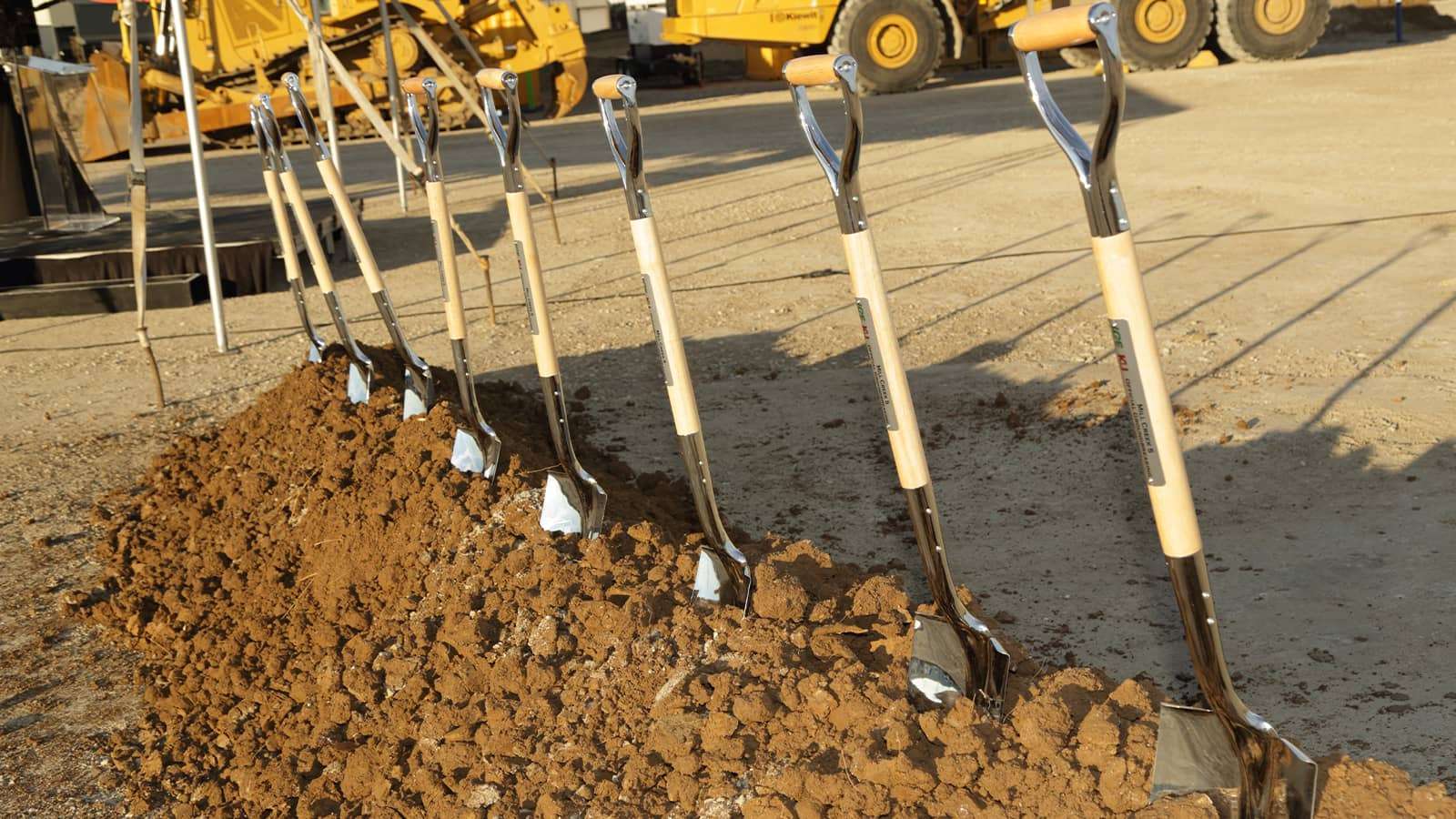 Groundbreaking ceremony - shovels in a pile of dirt