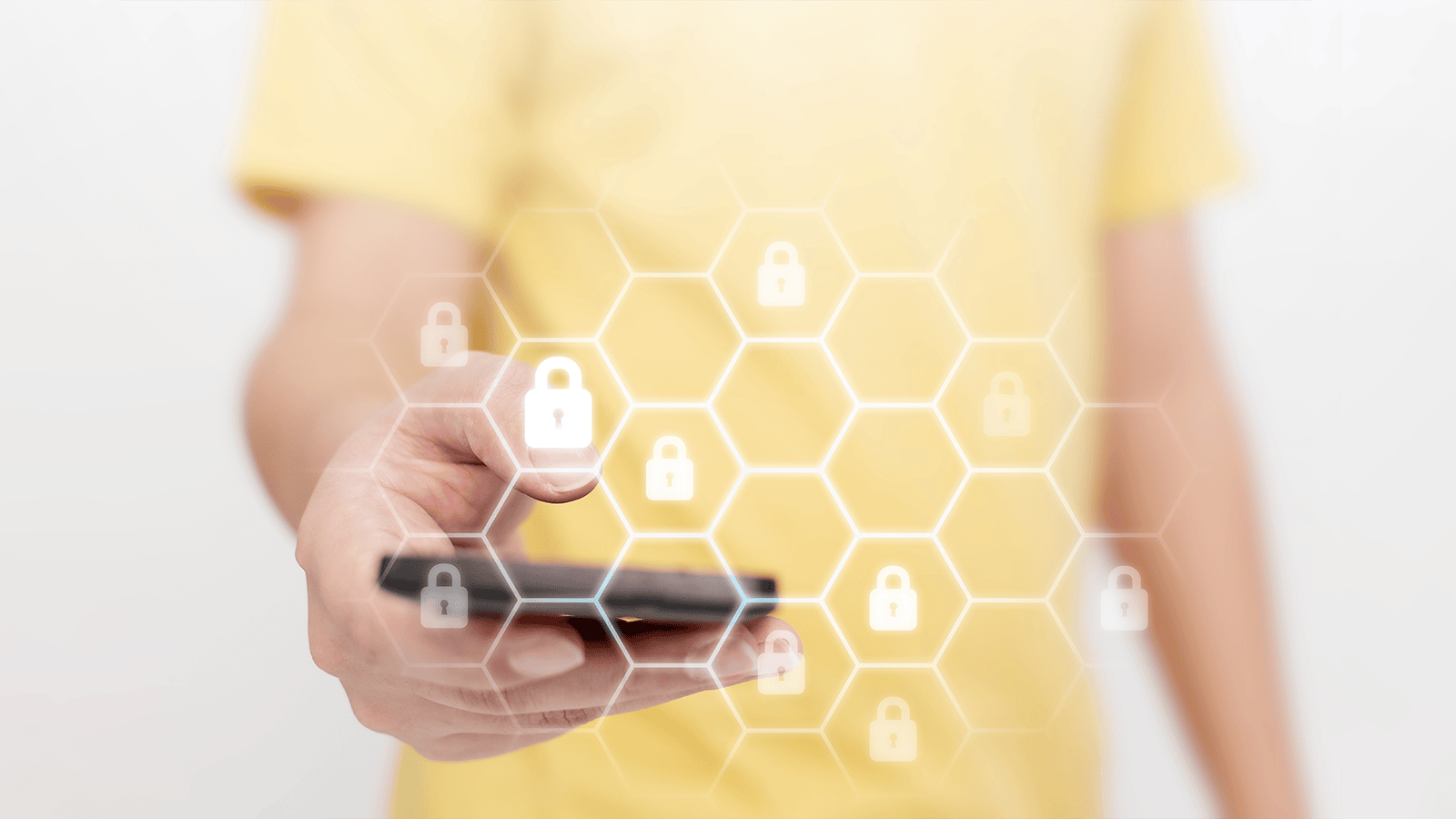 person holding smartphone with honeycomb locks