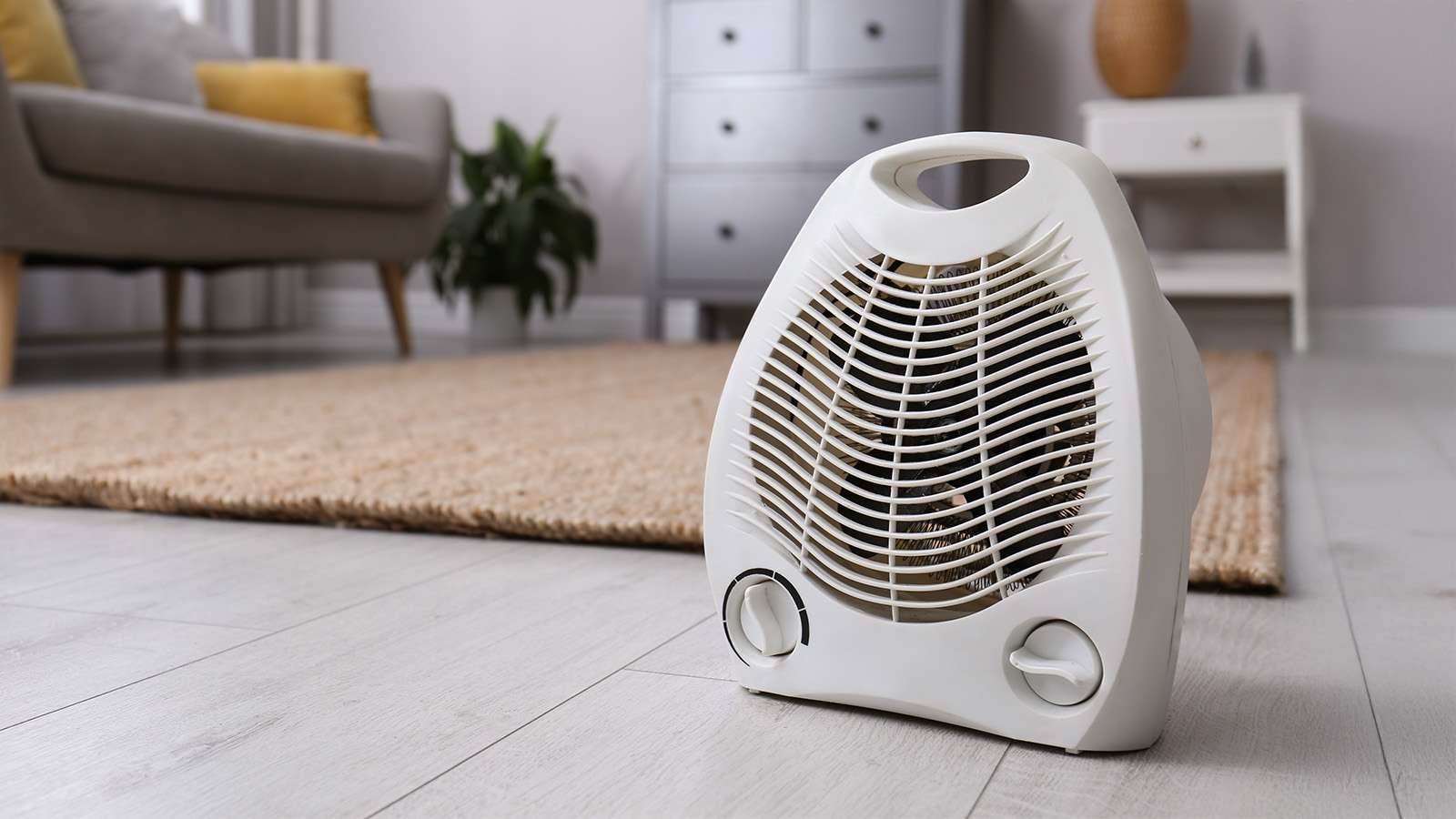 space heater on laminate floor in a room
