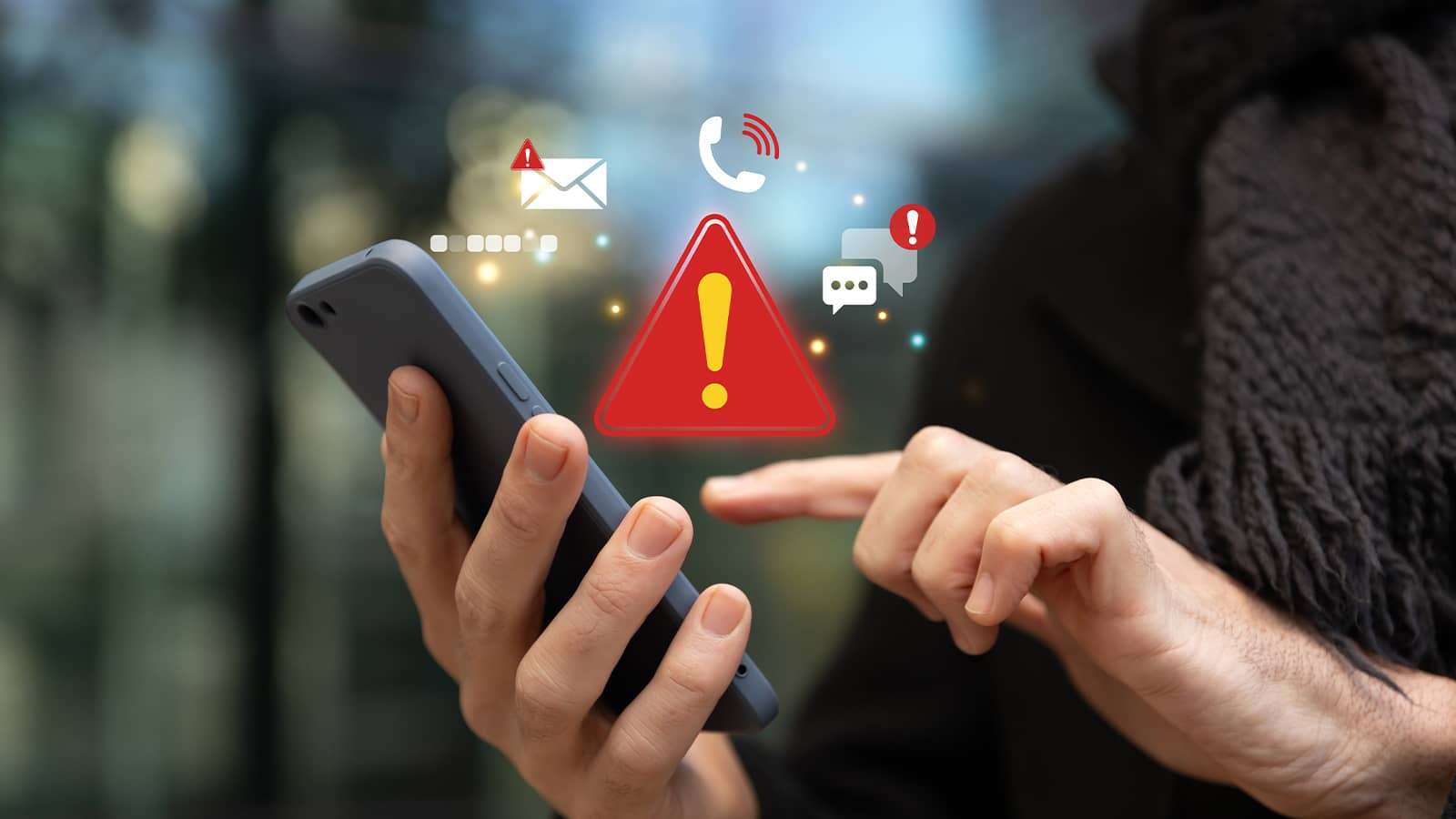 Hands using a smartphone, with alert icons floating over it.