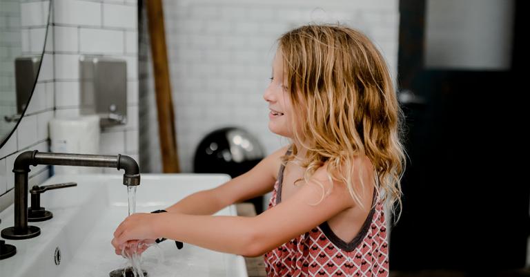 Child washing hands