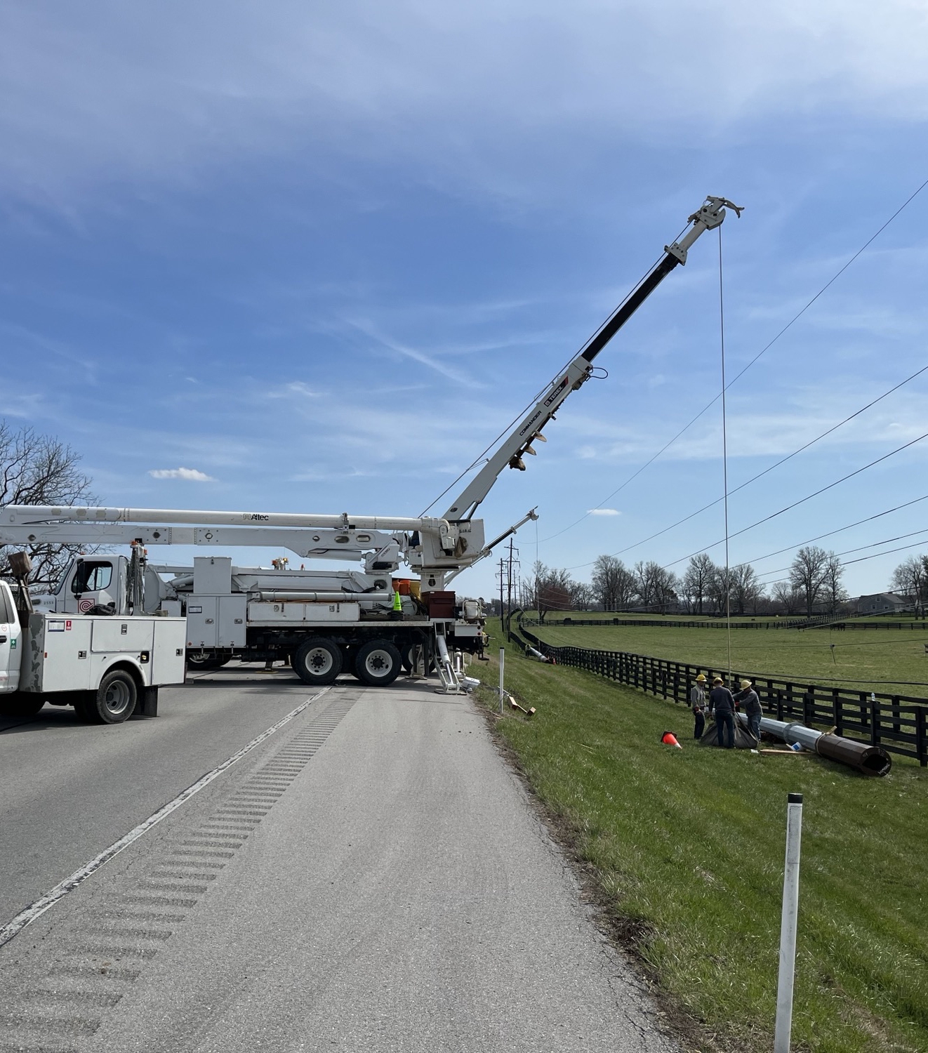 power pole repair along a highway