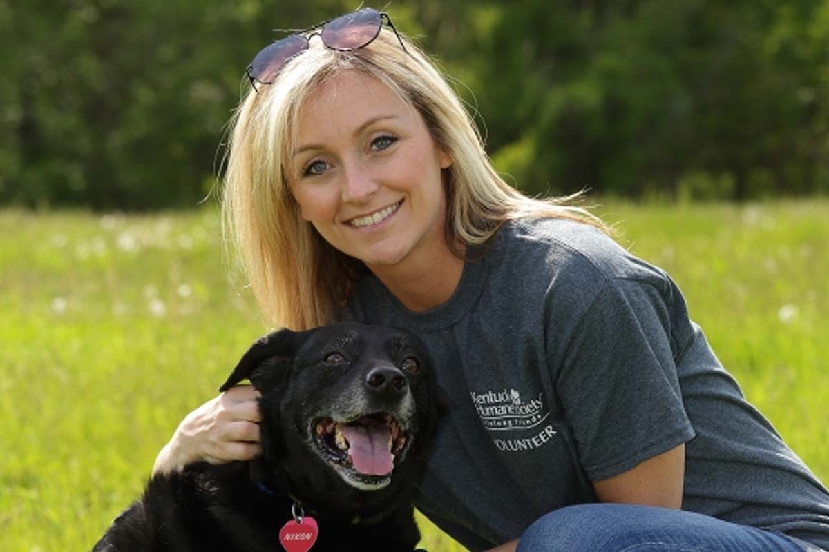 photo of Julie Weihe and black dog