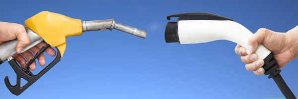 image of gas pump handle and EV charger handle